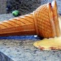 How does sugar affect ice cream melting?